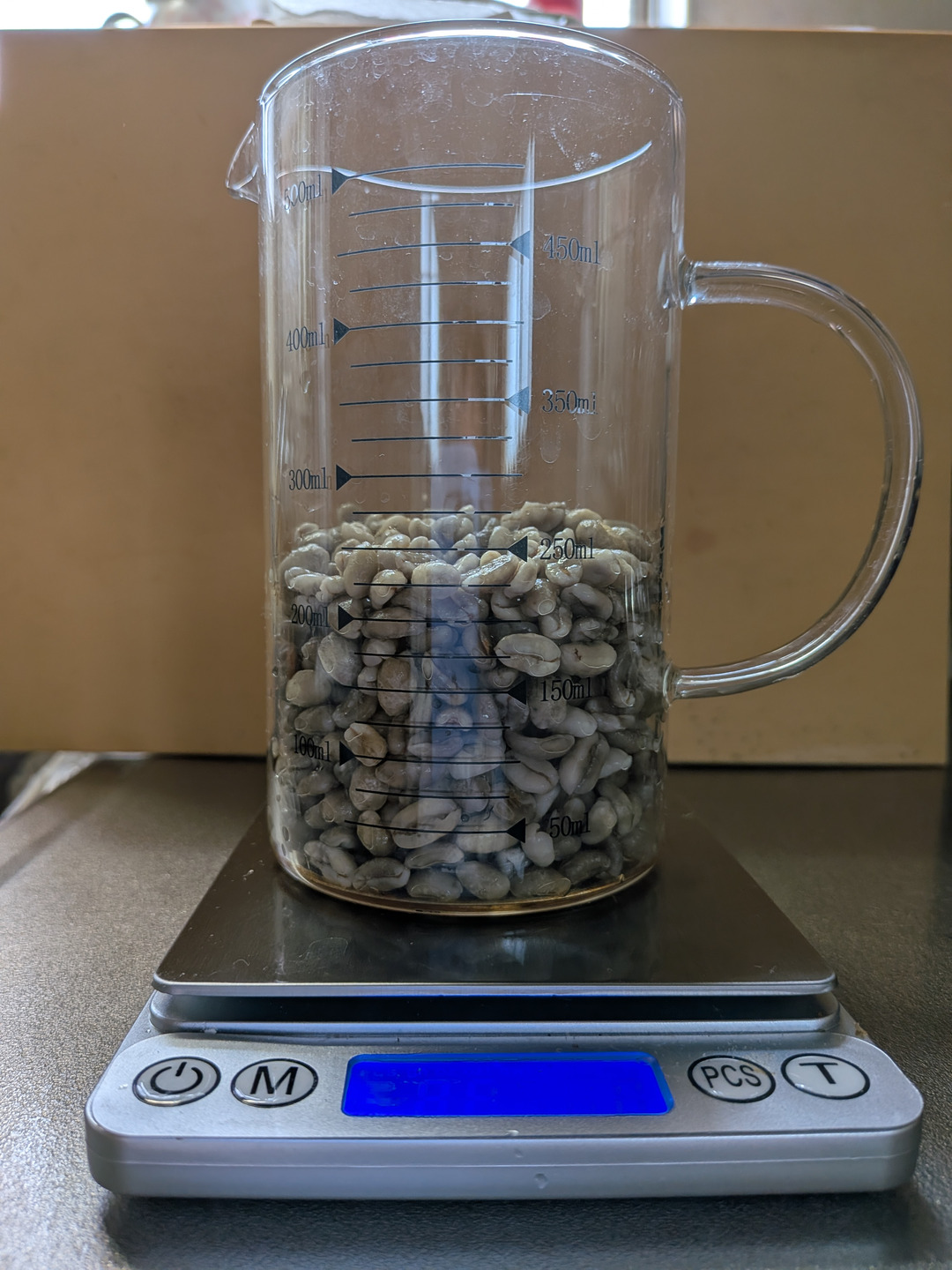 Prepared green beans in the glass cylinder